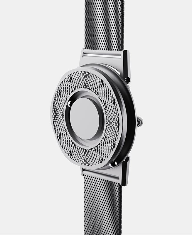 A 3/4 angle composition shot of the Eone Switch. You can see the Sunflower ring with each ball bearing on the face and around the case.