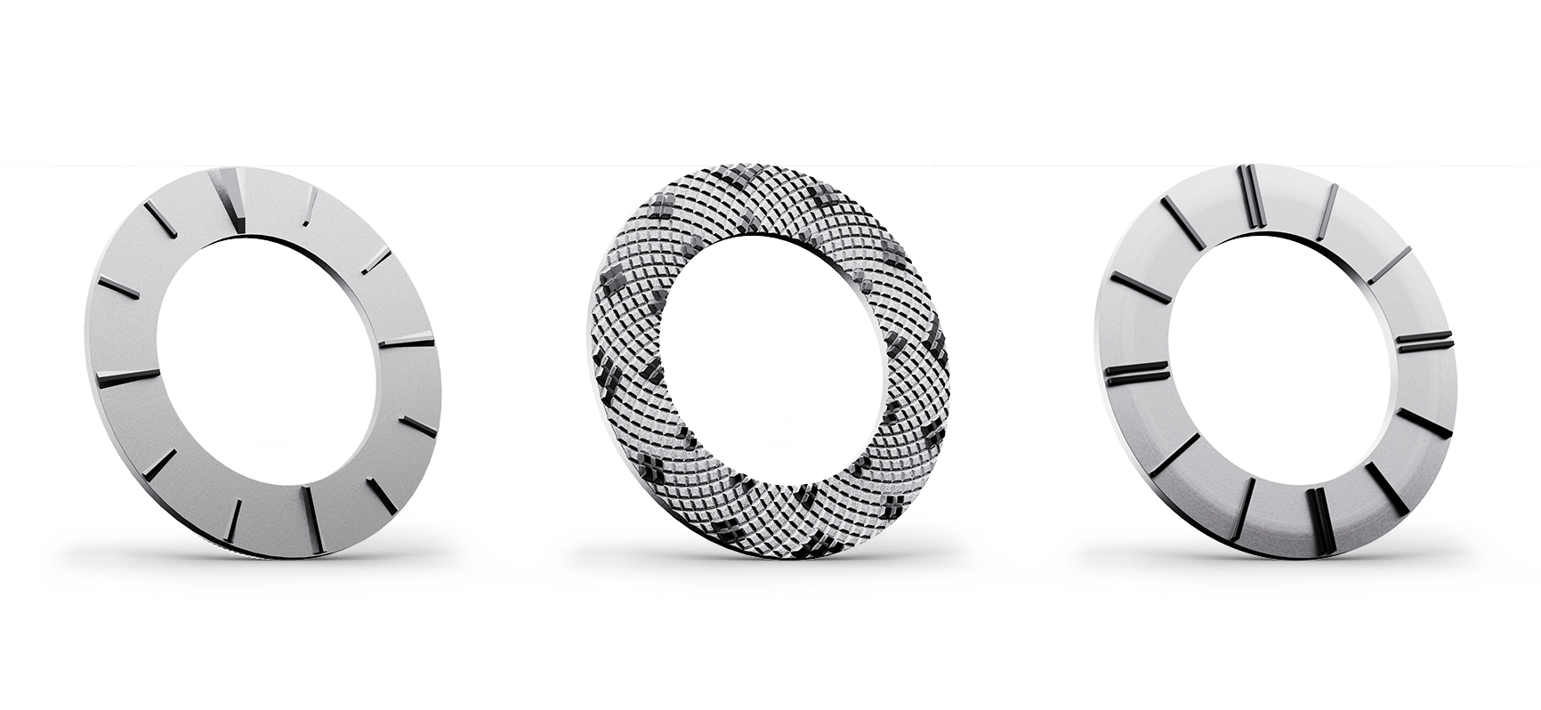 A lineup of three rings for the Switch. From left to right; a 12 hour ring, The middle ring; named the Sunflower was inspired by the Fibonacci spirals that are found on the seed patterns on sunflowers and The third ring on the right is an Apex ring.