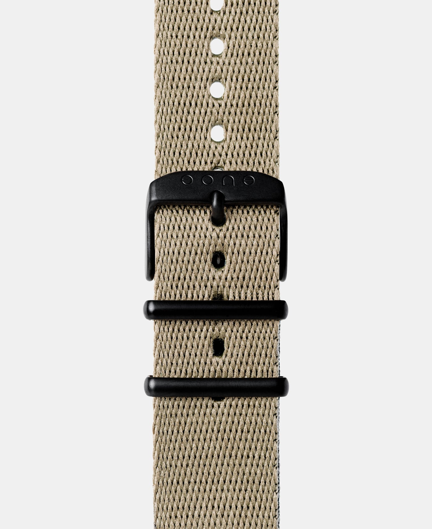 A photo shows the strap lying on a flat surface. One part has a buckle and the other part has a series of holes for an adjustable fit.