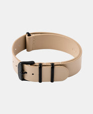 A photo shows the strap lying on a flat surface. One part has a buckle and the other part has a series of holes for an adjustable fit.