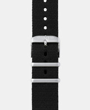 A photo shows the strap lying on a flat surface. One part has a buckle and the other part has a series of holes for an adjustable fit.
