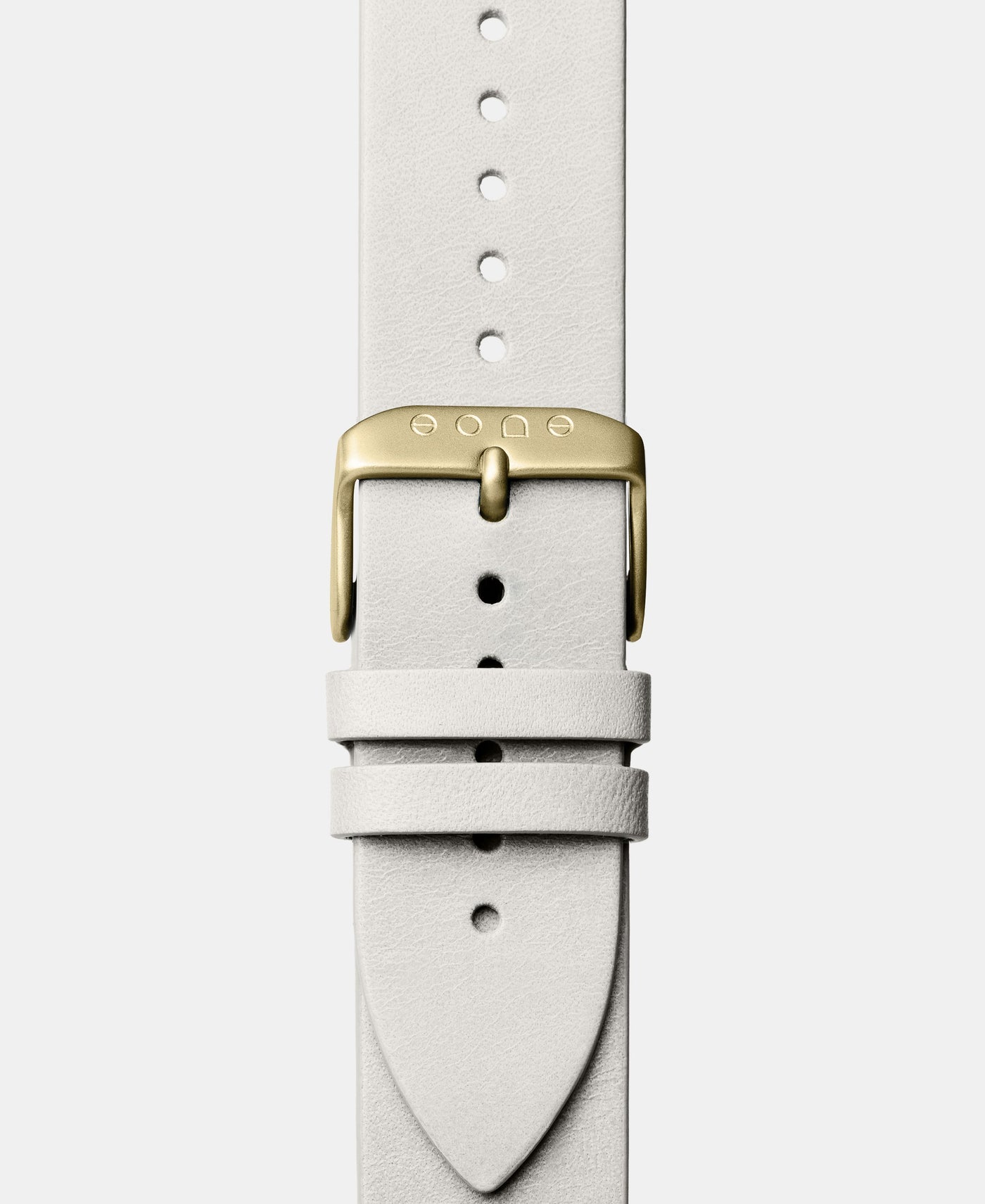 A photo shows the strap lying on a flat surface. One part has a buckle and the other part has a series of holes for an adjustable fit.