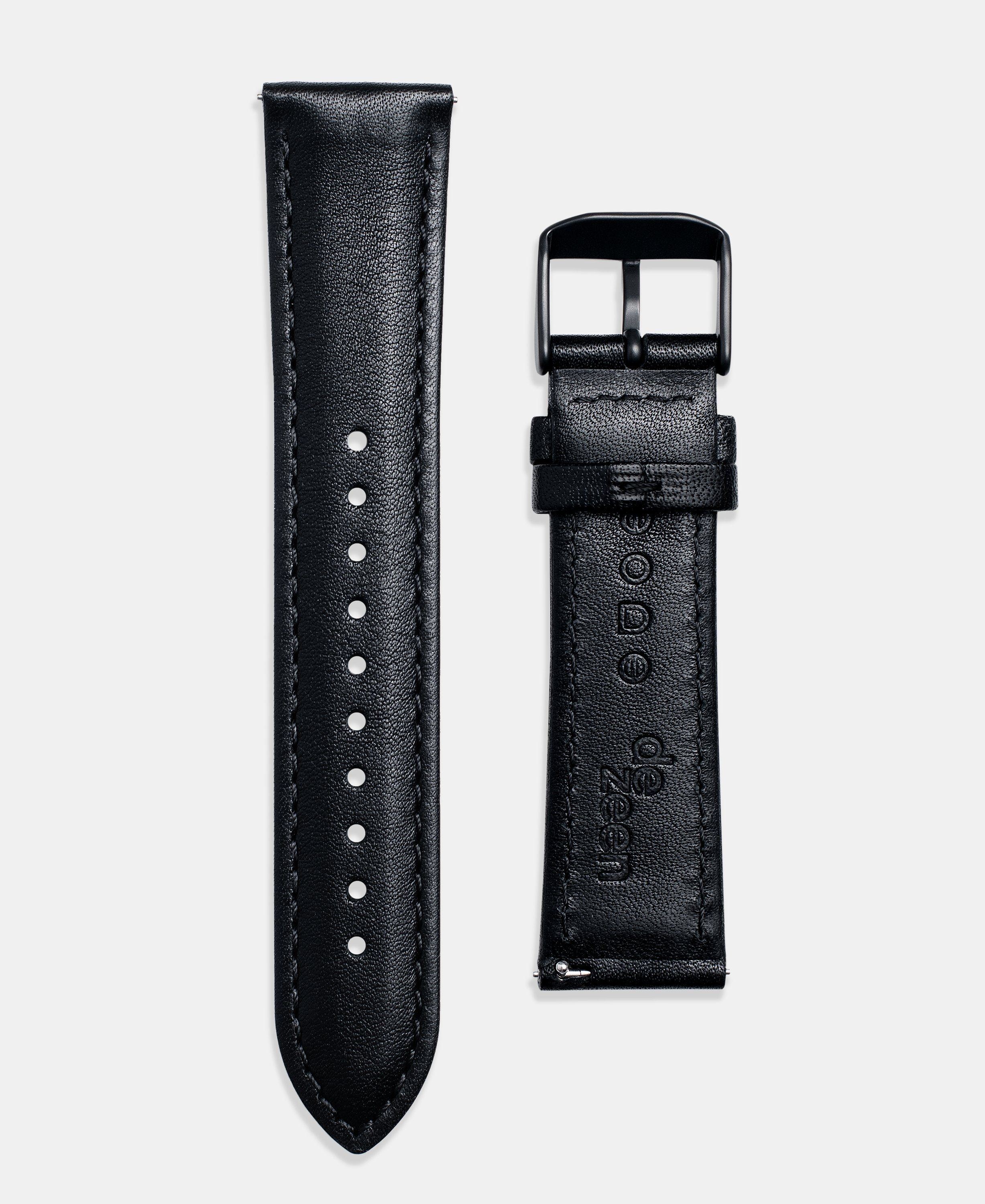 A photo shows the strap lying on a flat surface. One part has a buckle and the other part has a series of holes for an adjustable fit.