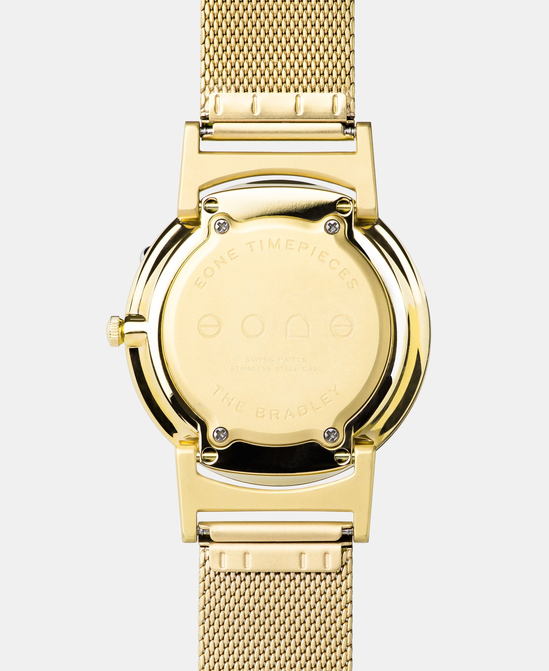 Load image into Gallery viewer, A photo of the back of the watch, showing the back plate engraved with the Eone logo.