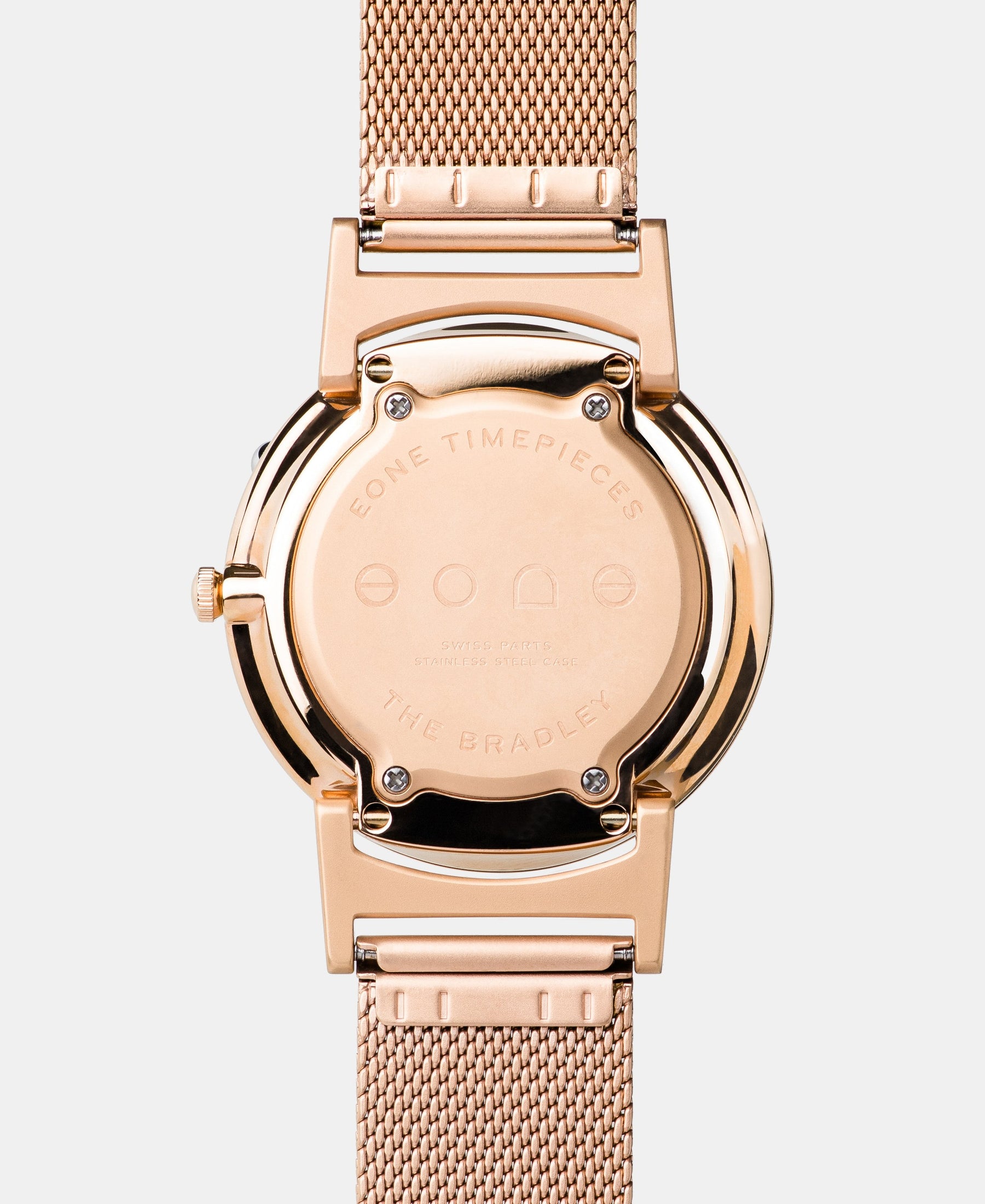 Load image into Gallery viewer, A photo of the back of the watch, showing the back plate engraved with the Eone logo.