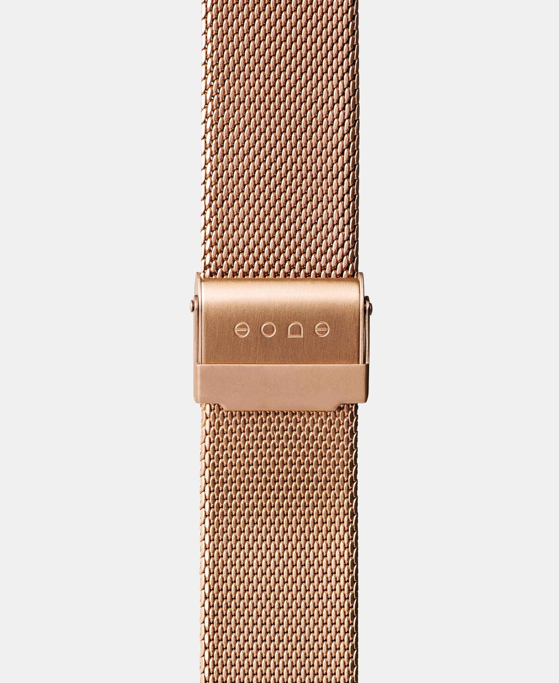 Load image into Gallery viewer, A photo shows the strap lying on a flat surface. One part has a fixed clasp and the other part has an adjustable clasp for a custom fit.