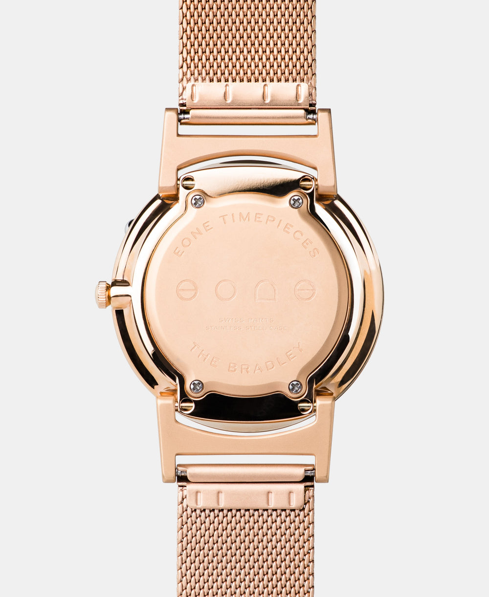 A photo of the back of the watch, showing the back plate engraved with the Eone logo.