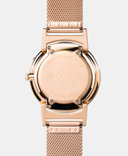 A photo of the back of the watch, showing the back plate engraved with the Eone logo.