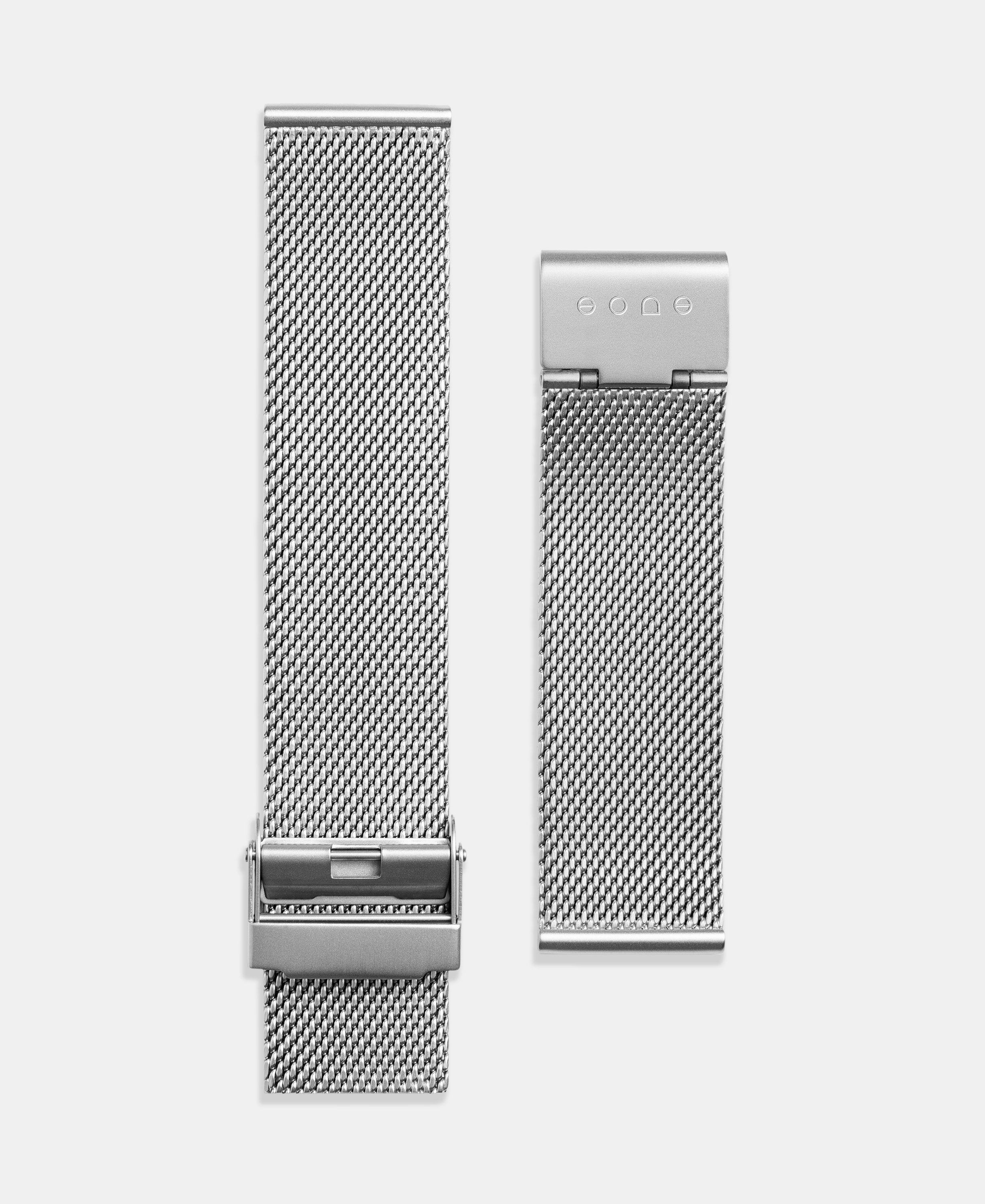 A photo shows the strap lying on a flat surface. One part has a fixed clasp and the other part has an adjustable clasp for a custom fit.